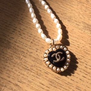 Vintage Chanel charm on a peak strand necklace